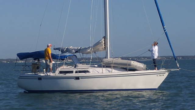 Interlude II: at anchor at Three Rooker Island.  Joe, Barb & Artie